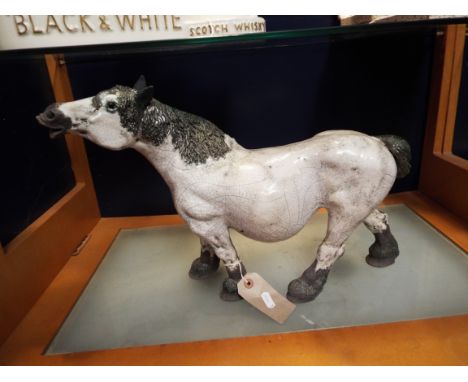 A large crackle glazed model of a shire horse