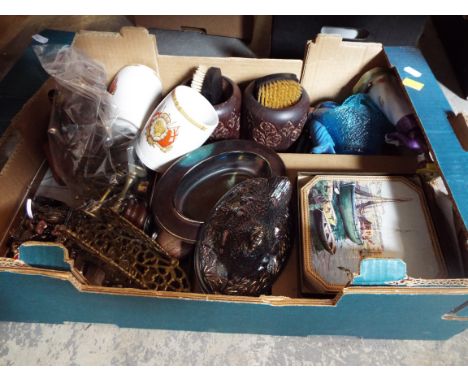 A mixed selection of items to include brassware, cutlery, beakers, carved brush pots and vintage tape measure 