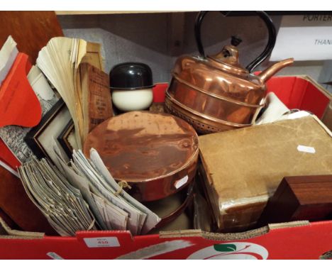 A box of miscellaneous items to include a copper kettle on stand, two Homepride figures, postcards, a hip flask, plated cutle