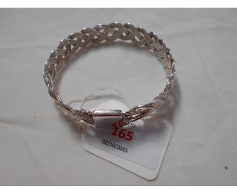 A sterling silver hallmarked braided bangle