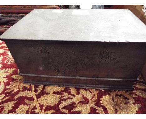 A Kut Hing Swatow pewter caddy of rectangular form incised with fire toe dragons and bamboo shoots, stamped and signed to bas