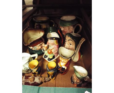 A collection of Toby and character jugs to include Doulton, Beswick and Sylvac examples