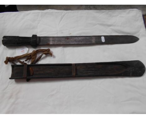 An Australasian machete in wooden scabbard 