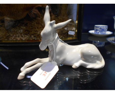 A Lladro childrens nativity figurine 'Donkey' in gloss finish approx 4.5" high x 6.5" long, marks to base