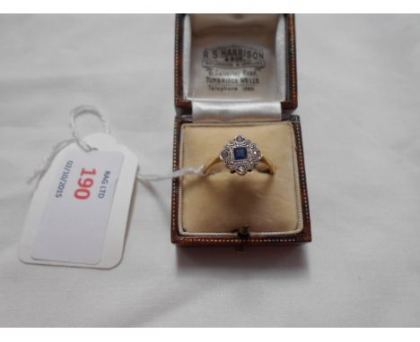 An 18ct gold and platinum sapphire and diamond set art deco ring, size Q