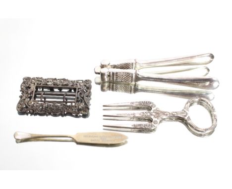 A case set of silver teaspoons, Sheffield 1942; various silver and plated condiment spoons; a pair of plated nutcrackers by M