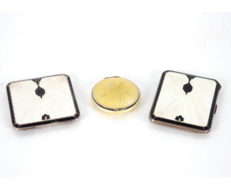 An Art Deco silver and enamel cigarette case with matching compact and circular silver and enamel decorated compact AF