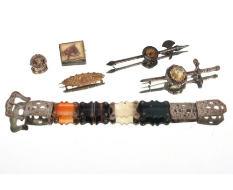 A 9ct gold brooch total weight approx. 2.5gms; a yellow metal and seed pearl memorial brooch 3gms; a silver brooch decorated 