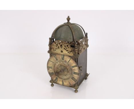 An 18th century brass lantern clock by John Bennett of Plymouth, pierced sides and top bell, 35cm high