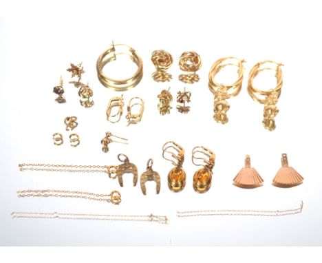 A pair of 9ct gold ear-rings with kitten drops approx. 2.5gms; a single yellow metal hoop ear-ring approx. 1gm; a pair of 9ct