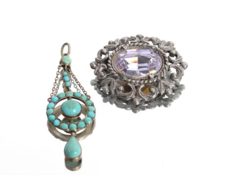 A Carol Merton pendant set with blue coloured stones, hung to chain; a white metal and turquoise set pendant; two costume bro