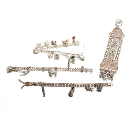A white metal bracelet, marked 830, 58gms; a silver charm bracelet with padlock clasp, 28gms and two other charm bracelets