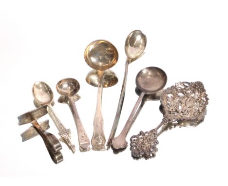A Scottish William IV silver sauce ladle, Edinburgh 1837; a silver Arts &amp; Crafts design preserve spoon, Sheffield 1923; a