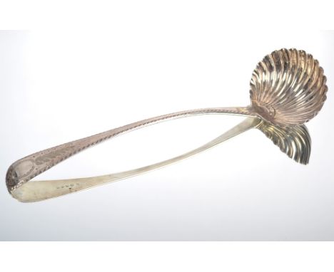A George III silver soup ladle by Peter, Anne &amp; William Bateman with engraved feathered decoration and vacant cartouche, 