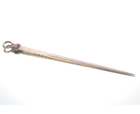 A George III meat skewer, by John Lampfert, the ring terminal above shell motif, London 1771, 32cm long 