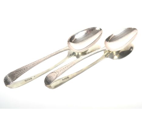 A pair of George III silver old English pattern tablespoons with bright cut decoration and monogrammed cartouche by John Lamb