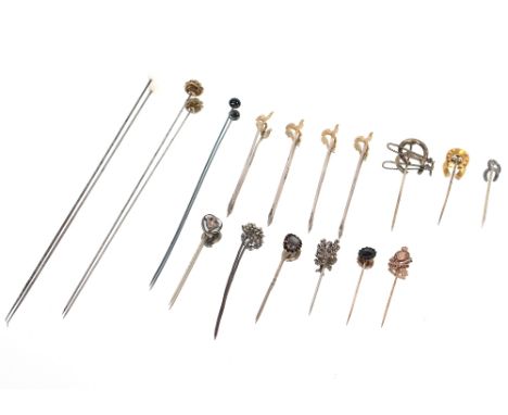 A 9ct gold Royal Army Corps enamel decorated stick pin, eight various yellow and white metal stick pins, three hat pins and f