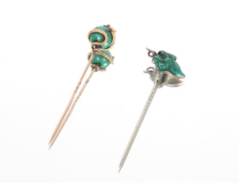 A yellow metal and Malachite stick pin, 5gms, 7cm;and a white metal and Malachite stick pin, 2.5gms, 7cm