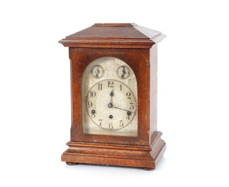 A Victorian oak cased chiming mantel clock, having silver dial with subsidiaries, 43cm high