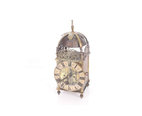 A brass lantern clock having twin fusee movement, the dial inscribed "J Moore, Ipswich", striking on a top bell, 38cm high