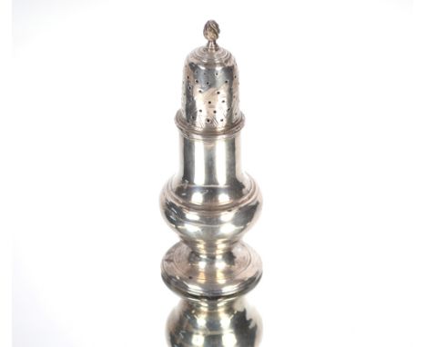 A George III silver baluster pepper pot by R Pearson, London 1774, 11.5cm high 