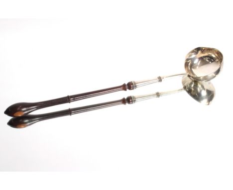 A George III silver punch ladle with turned fruitwood handle, London 1776