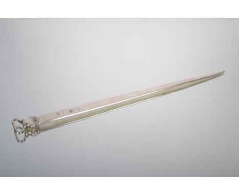 A late George II silver meat skewer with ring handle and shell terminal.  Maker Ebenezer Coker and Thomas Hannam, London 1759
