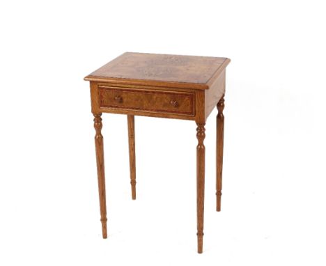 A pair of good quality walnut and cross banded lamp tables fitted with single drawers raised on turned tapering supports, 52c