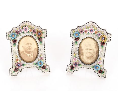 A pair of micro mosaic easel portrait photograph frames; a small framed embroidery and an oval portrait print of a naval offi