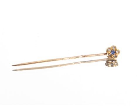 A yellow metal, sapphire and diamond set stick pin, 1.2 gms, 6 cm 