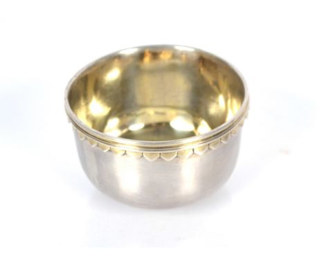 A small circular silver bowl, having gilded interior and serrated border, by Charles Reiley and George Storer, London 1830, 7