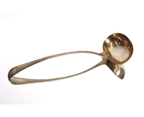 A George III Old English patterned silver ladle bearing family crest, London 1795