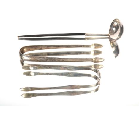 A pair of Irish silver sugar tongs, by William Law, Dublin.  Another pair of George III silver tongs by Peter, Anne and Willi