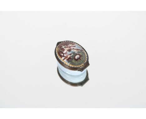 A small oval Bilston enamel patch box, the lid decorated with birds on a branch, AF