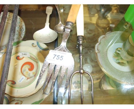  PICKLE FORK WITH SILVER BAND, A FISH FORK A WHITE METAL MUSTARD SPOON, AND AN EARLY TEA CADDY SPOON MARKS UNREADABLE.