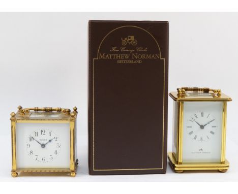 A Mathew Norman 8 day Swiss carriage clock, boxed with paperwork, 12cm tall, together with a Bell Bros example, 9cm tall. (2)