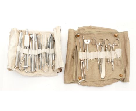 A 1940s H Hauptner Berlin army field surgical kit, together with another first aid example, produced by Carlwusthof Soligngen