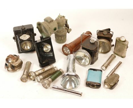 A collection of vintage lamps and torches including Smiths Wooton lantern, and other makers.