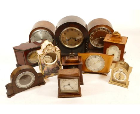A collection of mid 20th century and later mantel clocks and wall clocks, having manual wind and quartz movements, in two box
