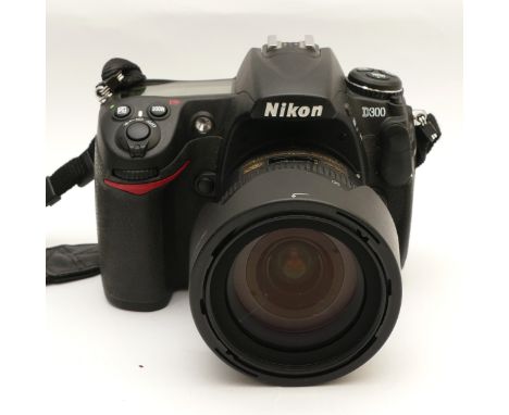 A Nikon D300 digital SLR camera, with a Nikon Nikkor AF-S f/3.5-4.5 18-70mm lens.