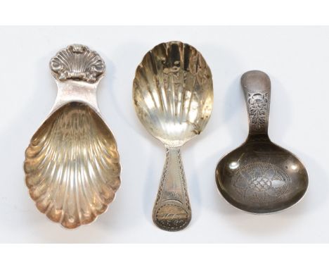A silver caddy spoon, Birmingham 1963, shell bowl and handle, together with a shell bowl and bright cut handle caddy spoon, L