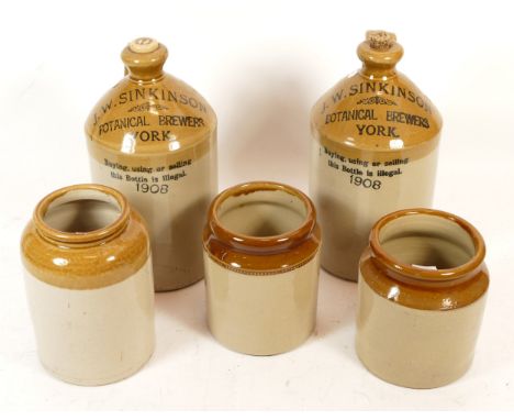 A Pair of stoneware flagons, circa 1908, bearing the name 'J.W.S. Sinkinson Botanical Brewers York.' Also stamped 'Buying, us