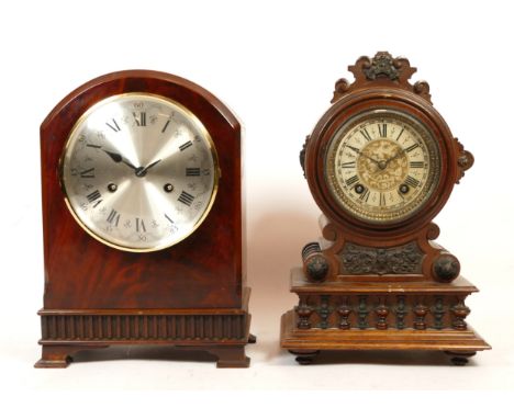 A late 19th early 20th century mahogany mantel clock, having 8 day movement striking on gong, 32cm tall, together with a late