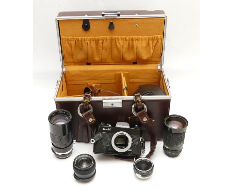 A 1970s Rolleiflex SL35M SLR camera, body only, a Miranda f/3.8-5.6 28-200mm lens, a Mamiya-Sekor f/3.5 38mm lens, a Tamron f