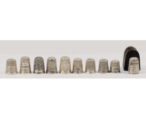 A Victorian silver thimble, London 1896, case and nine other silver thimbles, 37gm