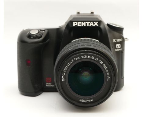 A Pentax K100D Super digital camera with a Pentax-DA f/3.5-5.6 18-55mm lens.