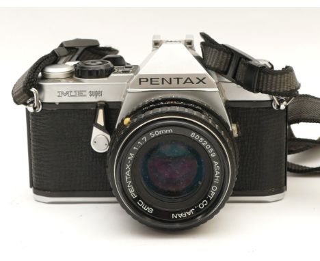 A Pentax ME Super SLR camera with Pentax-M f/1.7 50mm lens.
