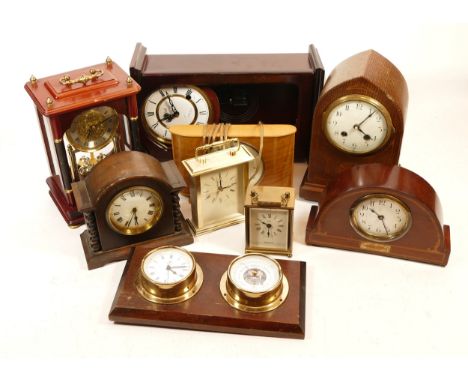 A collection of mid 20th century and later mantel clocks, having manual wind and quartz movements, in two boxes. (2)