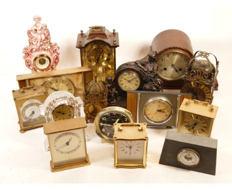 A collection of mid 20th century and later mantel clocks, having manual wind and quartz movements, in two boxes. (2)
