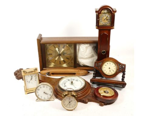 A collection of mid 20th century and later mantel clocks, having manual wind and quartz movements, in two boxes. (2)